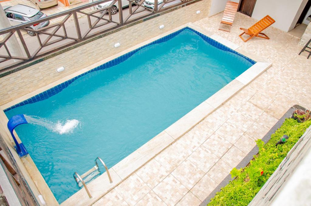 an overhead view of a swimming pool at Hotel Italia Beach in Natal