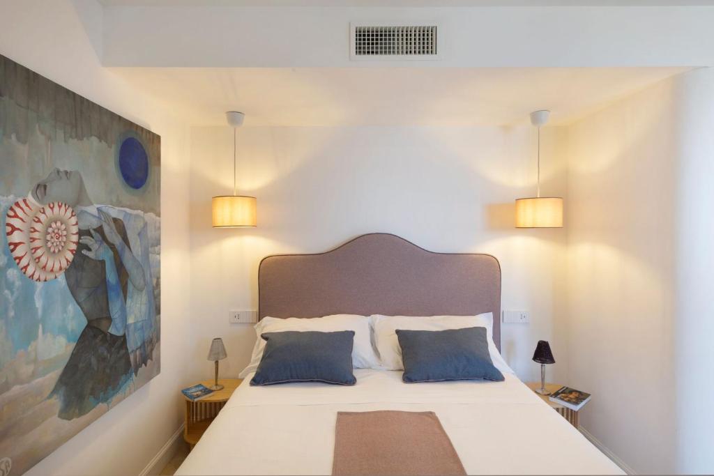 Postel nebo postele na pokoji v ubytování Villa Mundis Relais