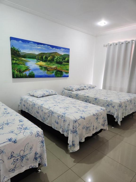 Postel nebo postele na pokoji v ubytování Pousada Vieira