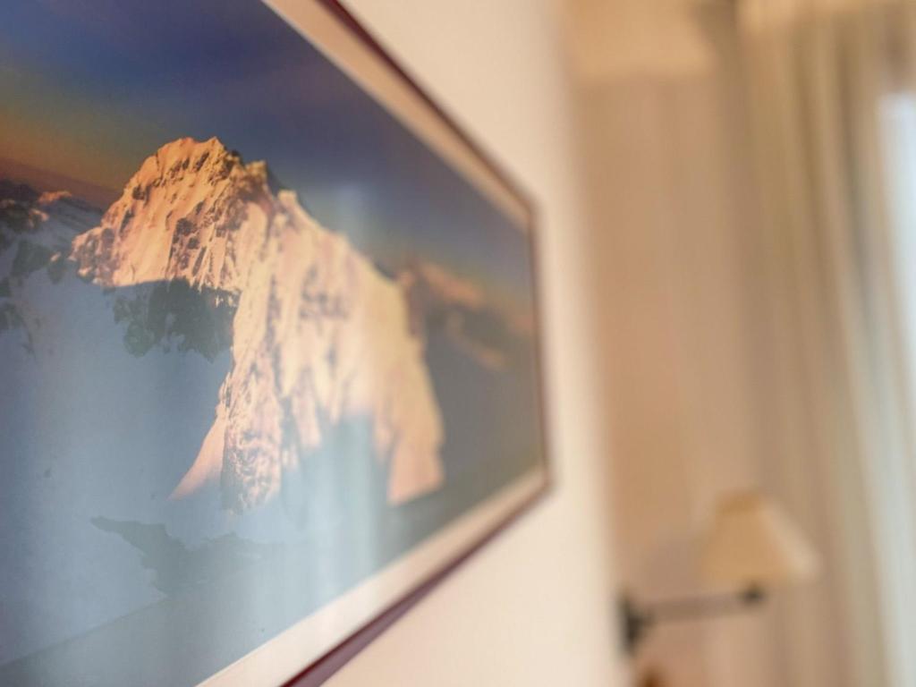 TV a/nebo společenská místnost v ubytování Dúplex con encanto en Puigcerdà Un lugar único!