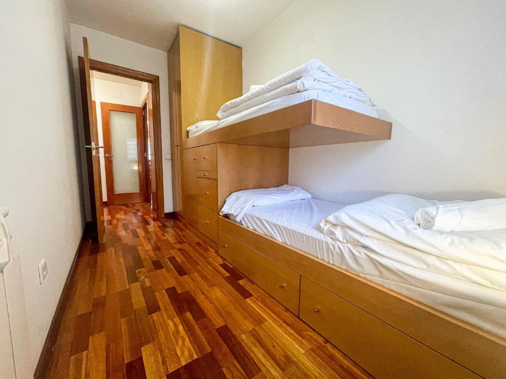 Postel nebo postele na pokoji v ubytování Dúplex con encanto en Puigcerdà Un lugar único!