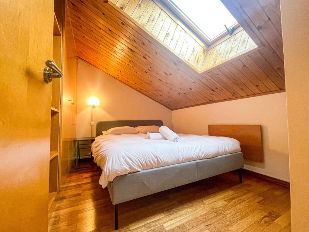 Postel nebo postele na pokoji v ubytování Dúplex con encanto en Puigcerdà Un lugar único!