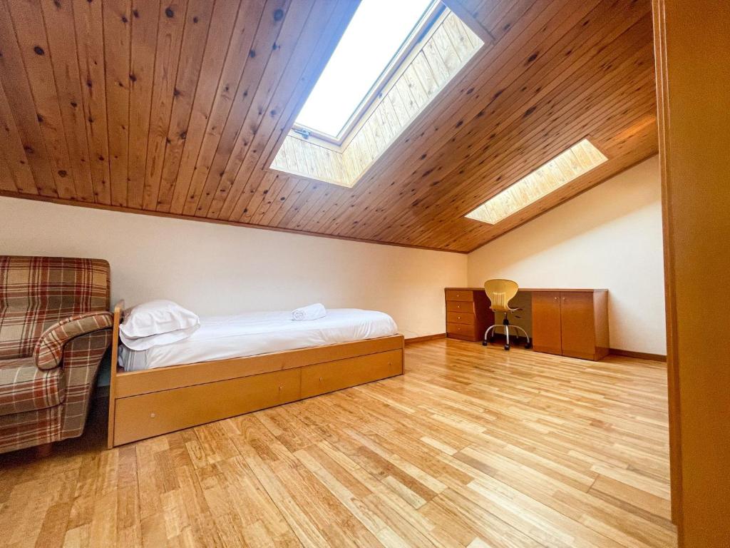 Postel nebo postele na pokoji v ubytování Dúplex con encanto en Puigcerdà Un lugar único!