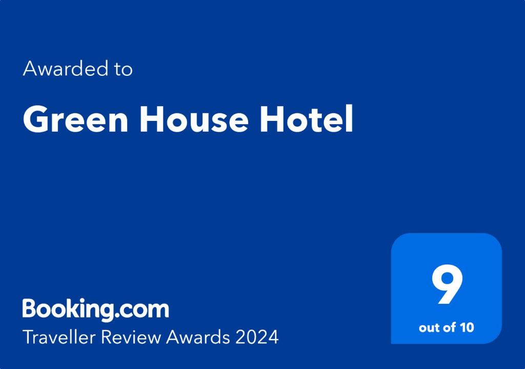 Ett certifikat, pris eller annat dokument som visas upp på Green House Hotel
