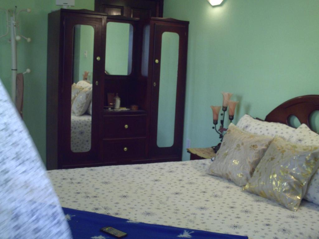 Postel nebo postele na pokoji v ubytování LeMarida Suites