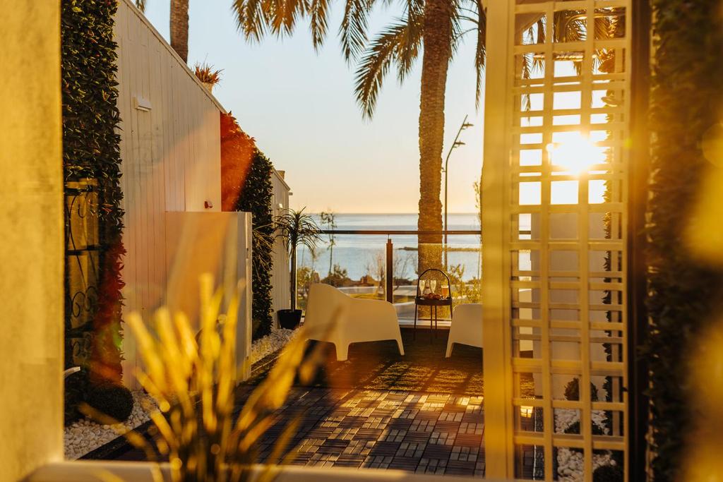 a view of the ocean from the balcony of a house at HOSTAL LUXURY NIT I DIA in Altea