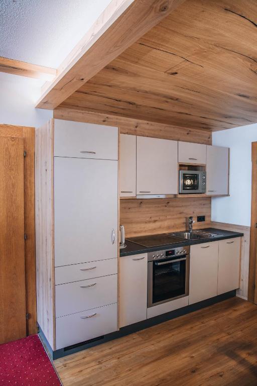 Kuchyň nebo kuchyňský kout v ubytování Appartement Christian
