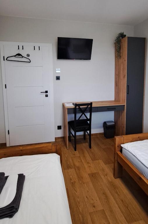 Postel nebo postele na pokoji v ubytování Noclegi u Lidki