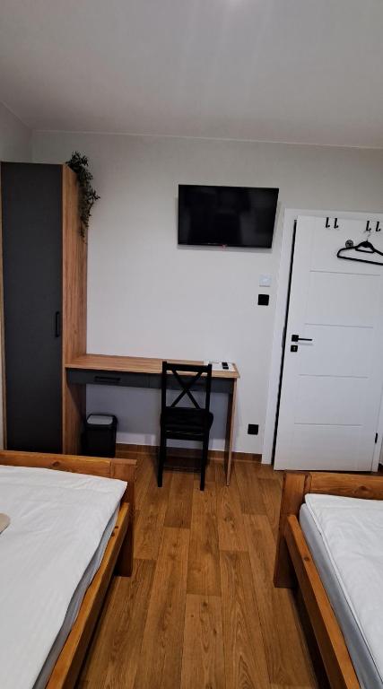 Postel nebo postele na pokoji v ubytování Noclegi u Lidki