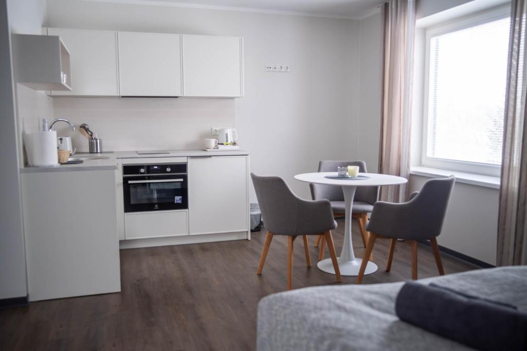 Kuchyň nebo kuchyňský kout v ubytování good mood guesthouse