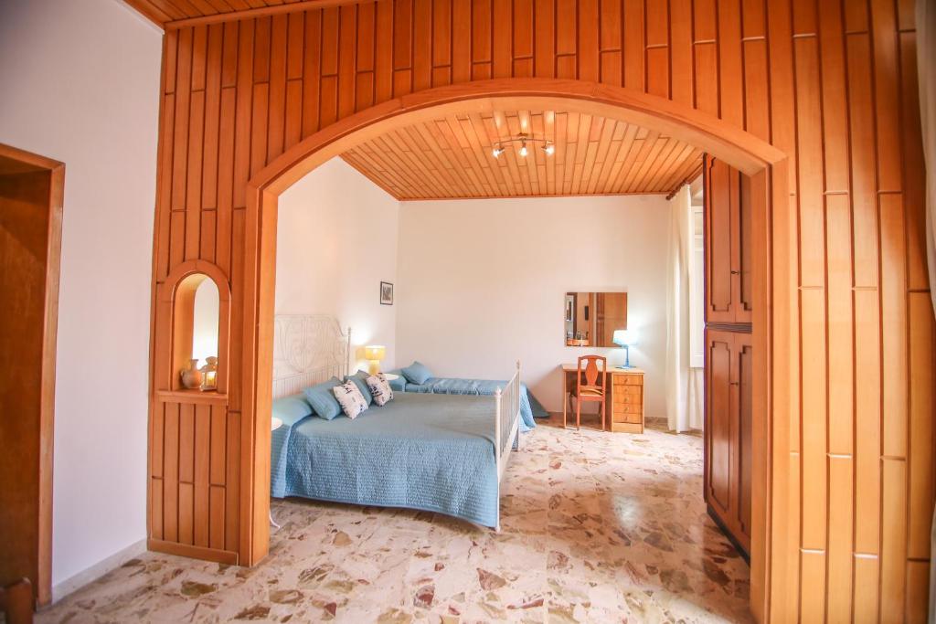 Postel nebo postele na pokoji v ubytování Soffio del Libeccio B&B