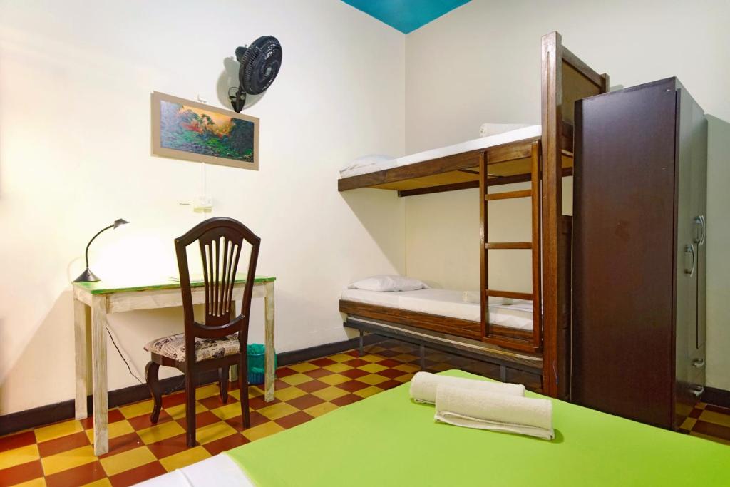 Postel nebo postele na pokoji v ubytování Ding-Dong Hostel