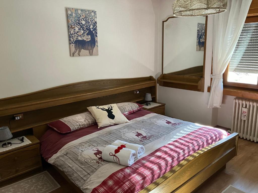 Postel nebo postele na pokoji v ubytování Affittacamere Iragidor
