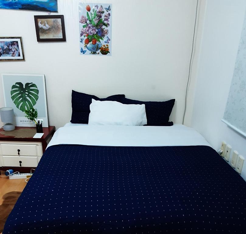 Postel nebo postele na pokoji v ubytování Shared house
