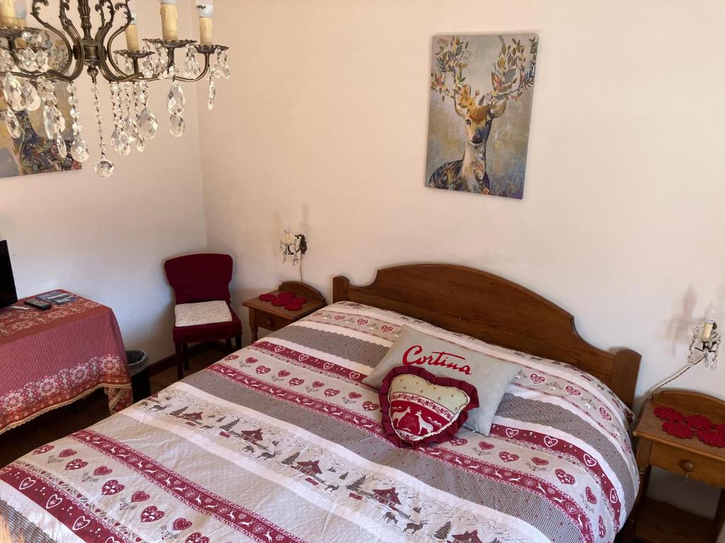 Postel nebo postele na pokoji v ubytování Affittacamere Iragidor