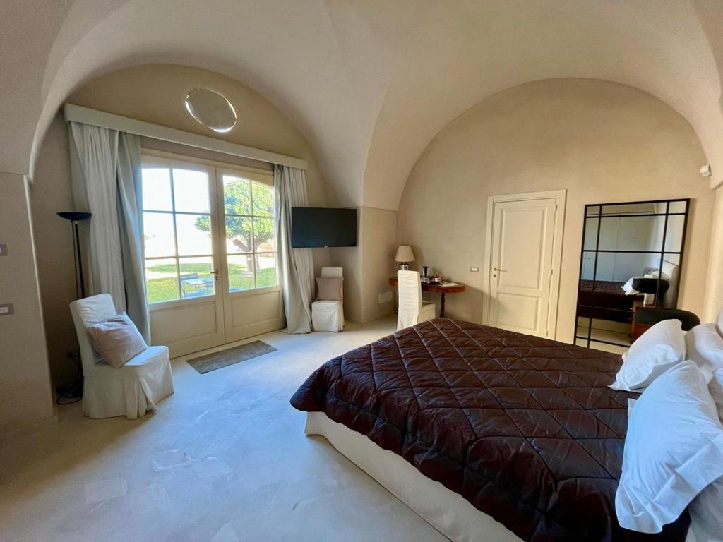 A bed or beds in a room at Casina Fontana Bed & Breakfast