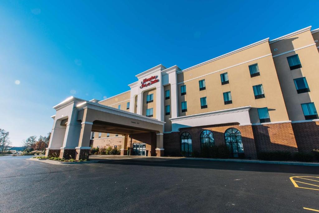 a rendering of a hotel with a parking garage at Hampton Inn & Suites Effingham in Effingham