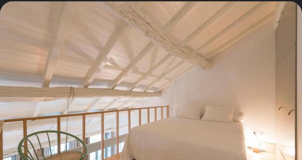 a bedroom with a bed on a balcony at Old Luxury Home in São Mamede de Infesta