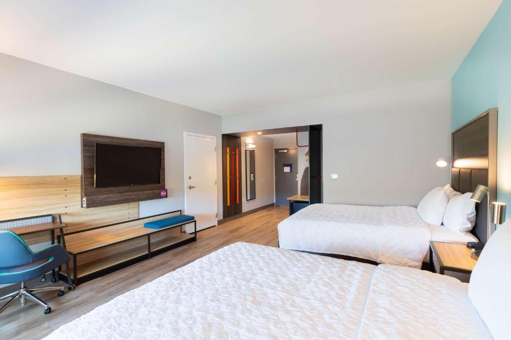 Postel nebo postele na pokoji v ubytování Tru By Hilton Eugene, Or