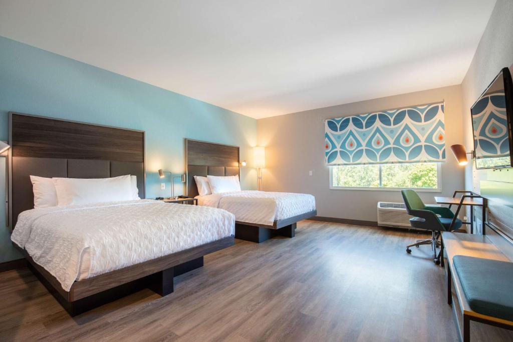 Postel nebo postele na pokoji v ubytování Tru By Hilton Eugene, Or