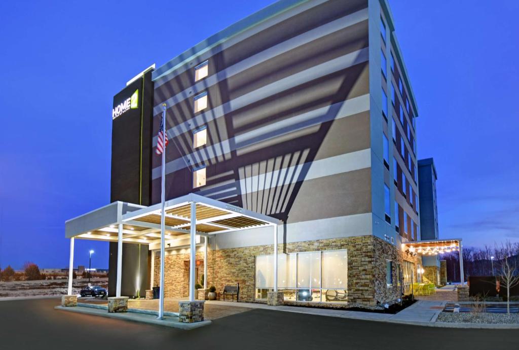 a rendering of a hotel building at night at Home2 Suites By Hilton Columbus in Columbus