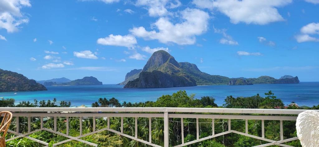 a view of the ocean from the balcony of a resort at Forest Camp El Nido in El Nido