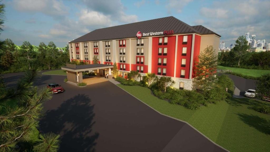 a rendering of a hotel with a red building at Best Western Plus Heritage Rail Inn & Suites in York