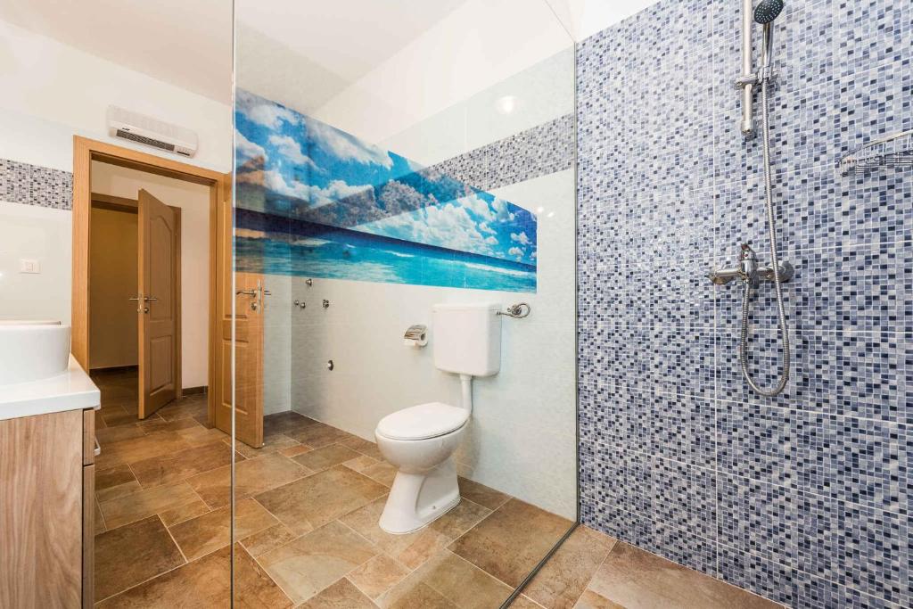 Kúpeľňa v ubytovaní Holiday home in Jasenice 31210