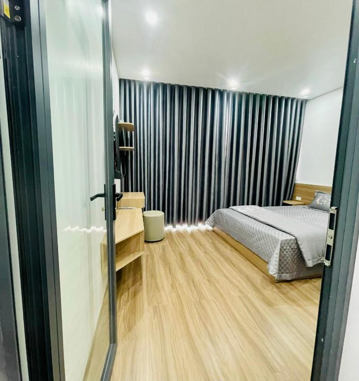 Khu phố Water Front - Chambre Double De Luxe Avec Balcon