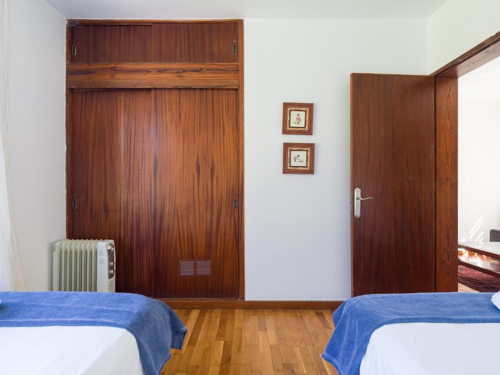 Postel nebo postele na pokoji v ubytování El Jardin de Santa Brígida with private pool, sauna & jacuzzi