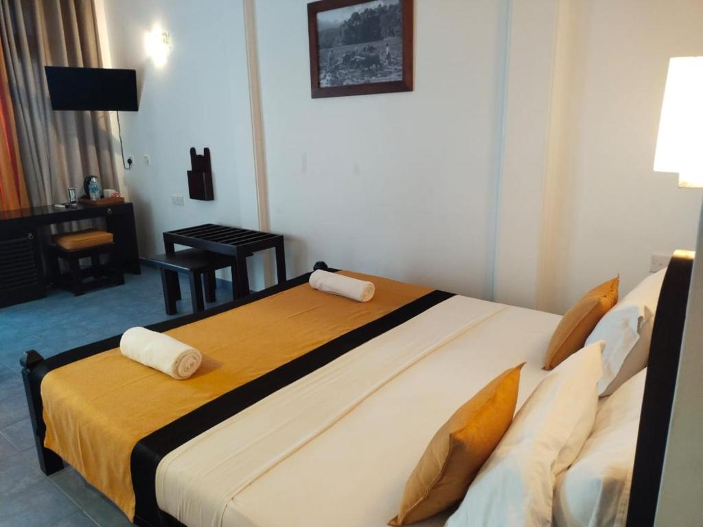 Postel nebo postele na pokoji v ubytování DALAWELLA BEACH RESORT