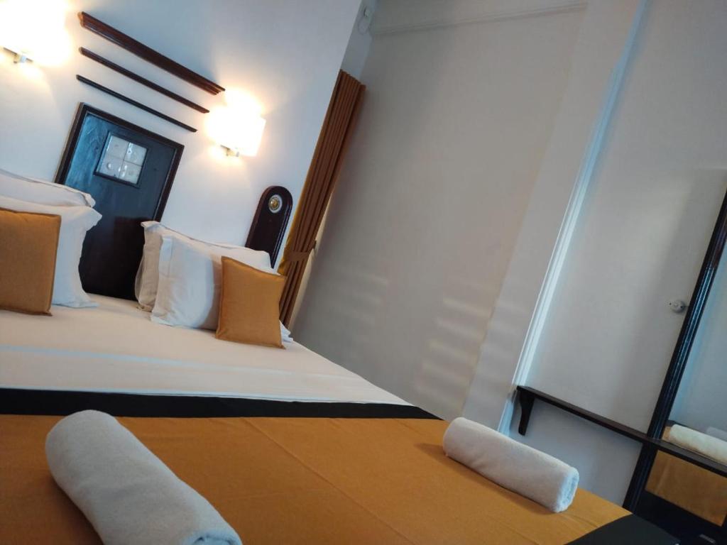 Postel nebo postele na pokoji v ubytování DALAWELLA BEACH RESORT