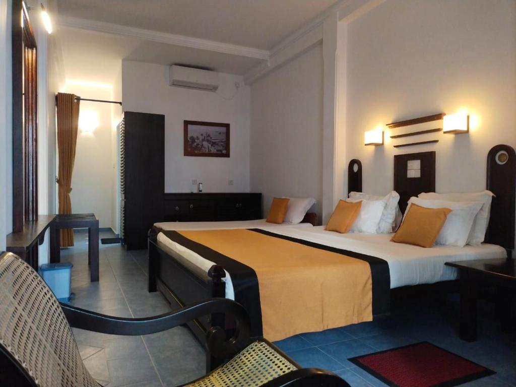 Postel nebo postele na pokoji v ubytování DALAWELLA BEACH RESORT