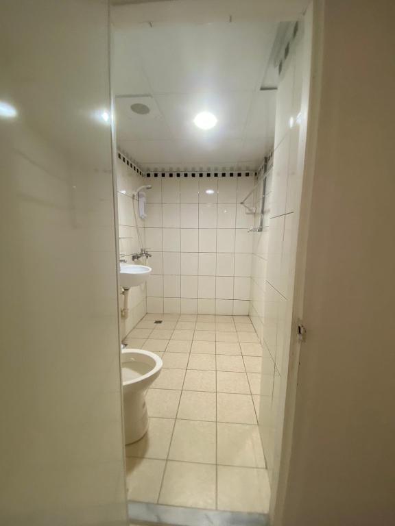 Koupelna v ubytování 新獅城商務旅館New Lion City Hotel