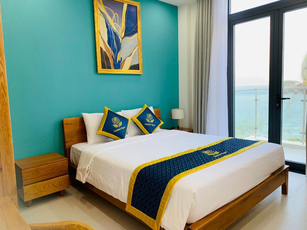 Postel nebo postele na pokoji v ubytování Golden Rose Hotel