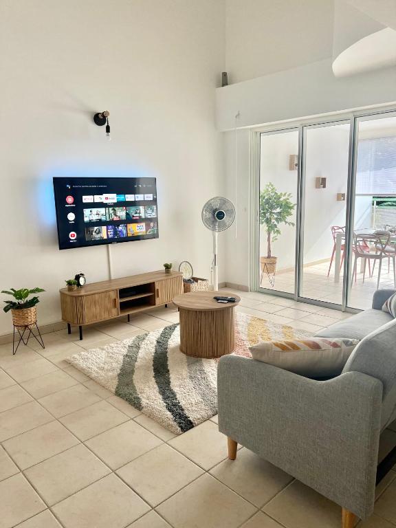 Televisor o centre d'entreteniment de Appartement Duplex Bélize