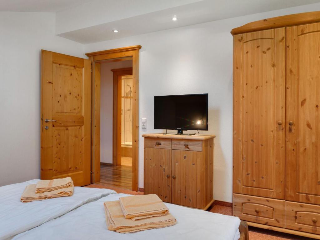 Postel nebo postele na pokoji v ubytování Spacious Apartment in GroBarl with Sauna
