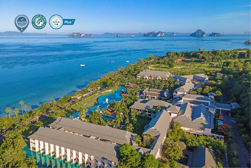an aerial view of the resort and the water at Sofitel Krabi Phokeethra Golf and Spa Resort in Klong Muang Beach