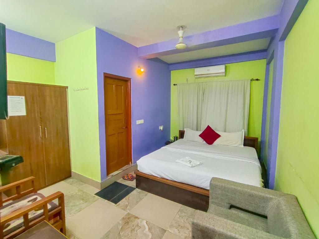 Postel nebo postele na pokoji v ubytování Green Wood Hotel