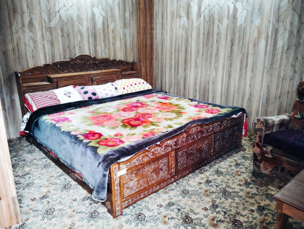 Ένα ή περισσότερα κρεβάτια σε δωμάτιο στο Guna guest house