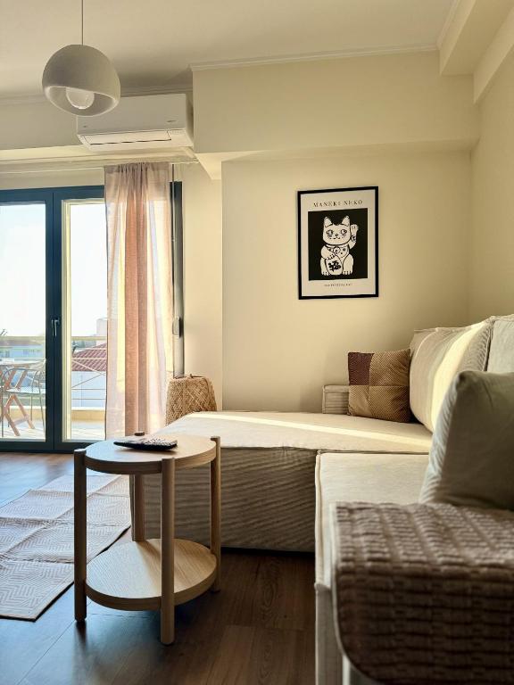 Postel nebo postele na pokoji v ubytování Uddo Apartment