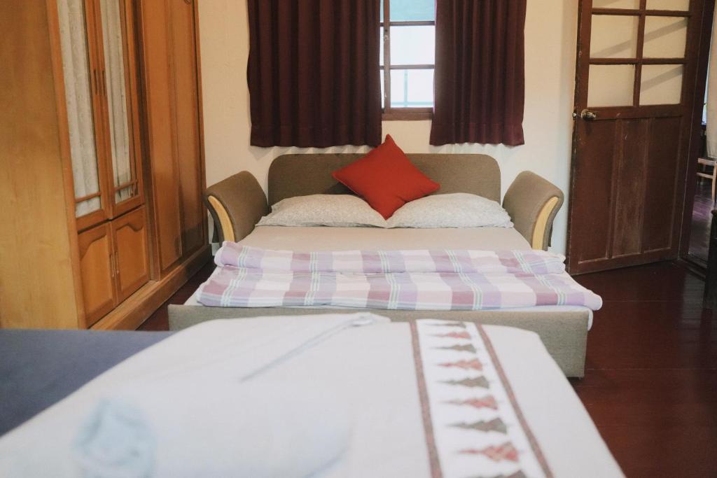 Letto o letti in una camera di A Touch of Zen