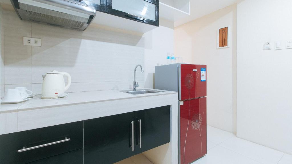 Kuchyň nebo kuchyňský kout v ubytování RedDoorz at Grand Apartelle Hernan Cortes Cebu