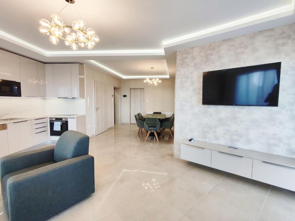 A kitchen or kitchenette at Royal Martin's Apartment