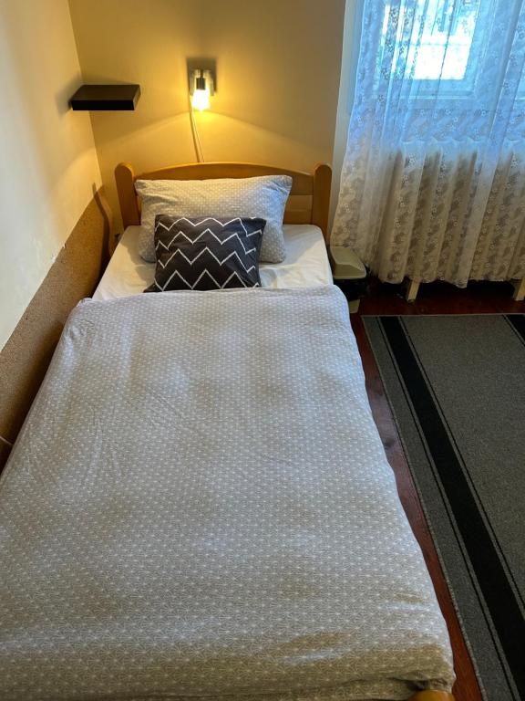 Postel nebo postele na pokoji v ubytování Guest House Anna Vendégház