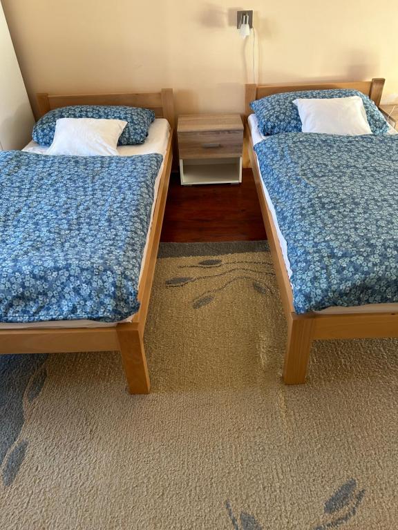 Postel nebo postele na pokoji v ubytování Guest House Anna Vendégház