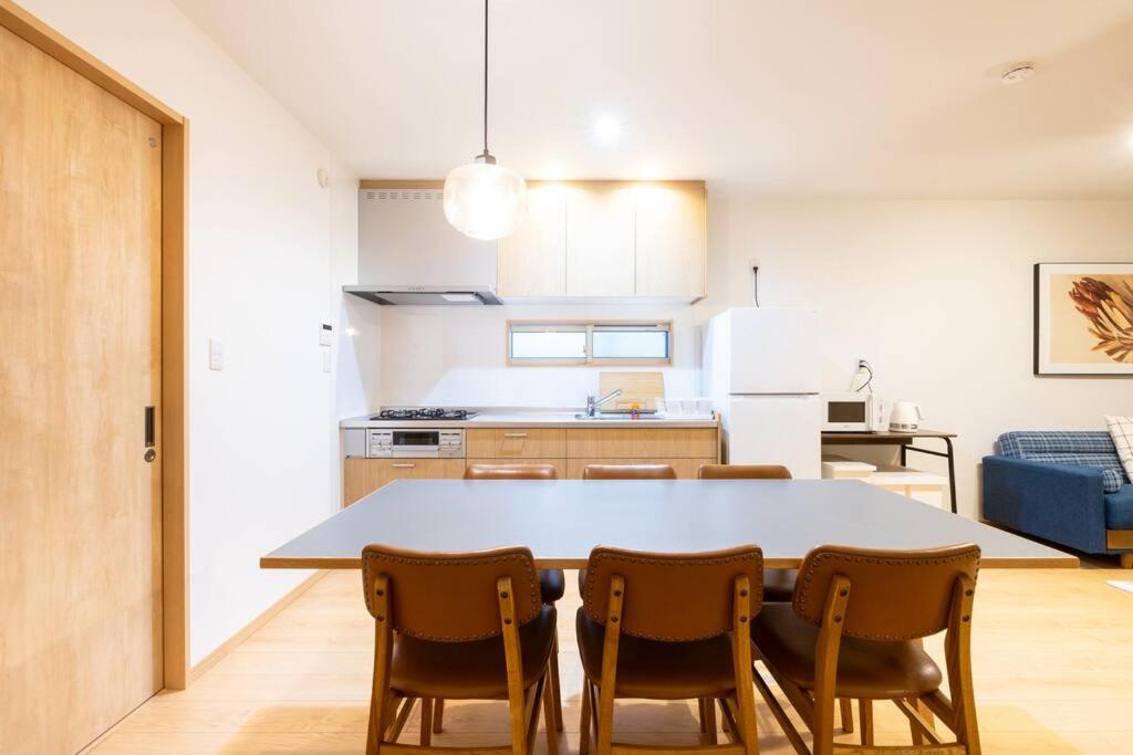 Una cocina o cocineta en ecru住吉logement 1