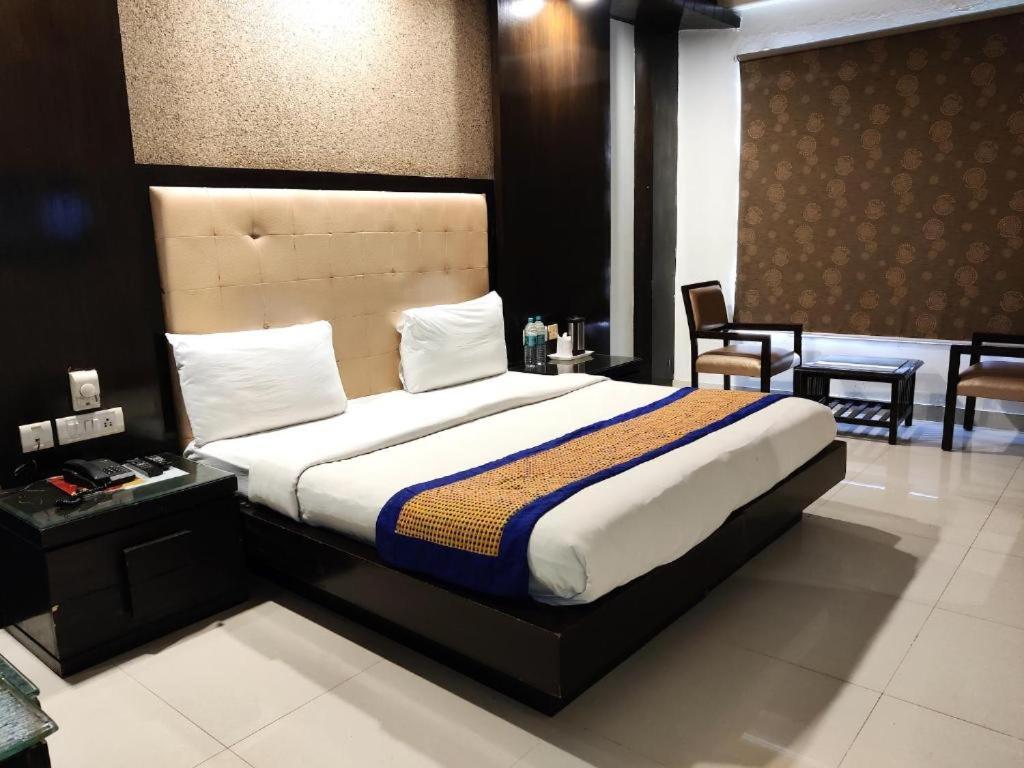 Postel nebo postele na pokoji v ubytování Hotel Delhi Pride, Karol Bagh