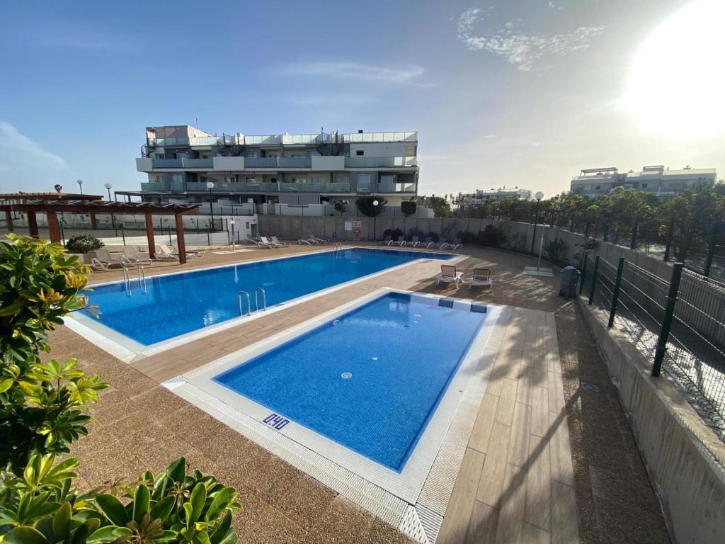 Luminoso Apartamento en La Tejita tesisinde veya buraya yakın yüzme havuzu