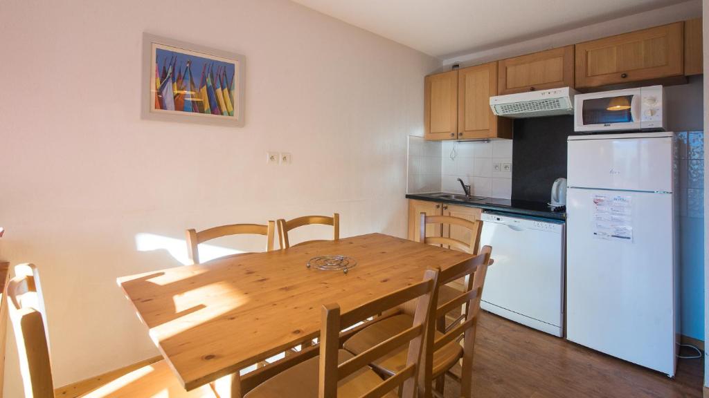 Kuchnia lub aneks kuchenny w obiekcie B305- Appartement 2 pieces cabine 6 personnes